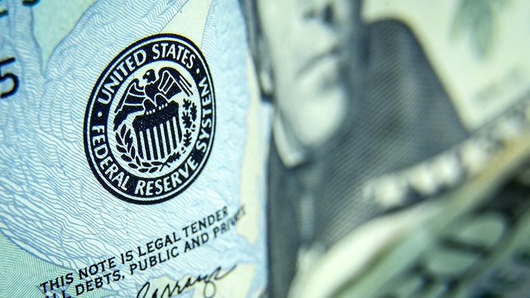 Closeup of a US Federal Reserve System stamp on a US note