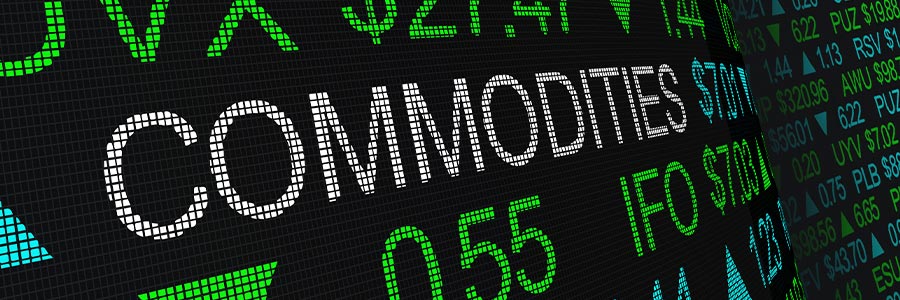Gros plan sur l’affichage numérique du mot « Commodities » parmi les prix sur les marchés financiers.