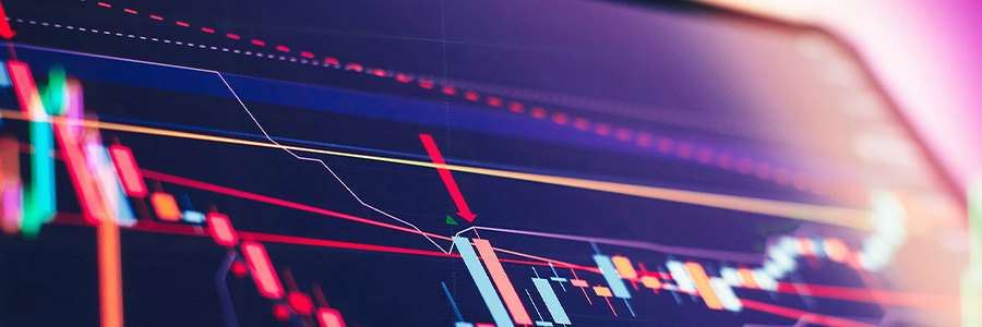 Digital stock price chart with candlesticks and trend lines.