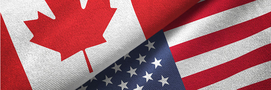 Close up of a Canada and U.S. Flag