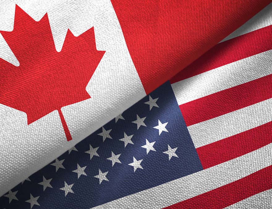 Close up of a Canada and U.S. Flag