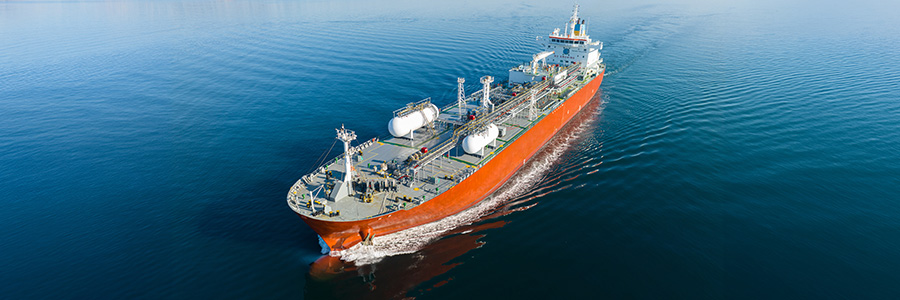 Oil tanker carrying energy cargo across open water.