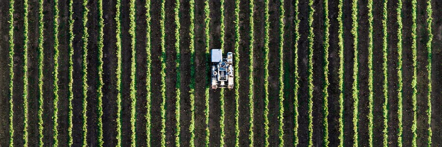 Aerial view of a tractor in a field