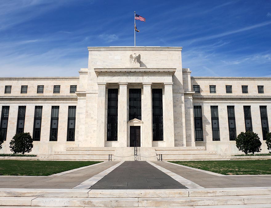 Exterior photo of the Federal Reserve Board building in Washington, D.C.