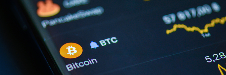 Bitcoin price charts displayed on a cryptocurrency trading app.