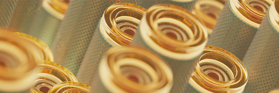 Close-up of a bunch of fibre optic cable connectors with gold-colored ferrules.
