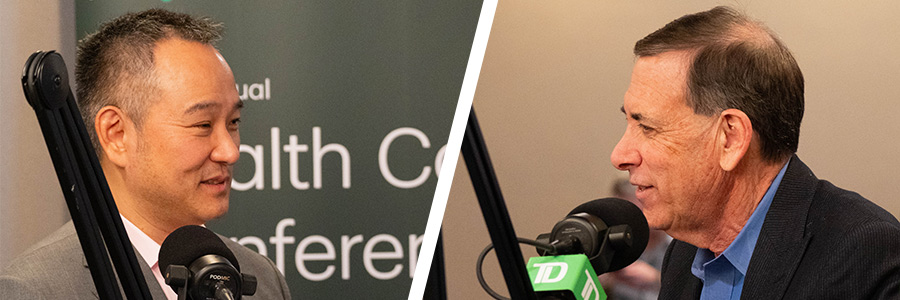 Charles Rhyee and Dr. Jon R. Cohen at microphones recording a podcast at the TD Cowen Health Care Conference