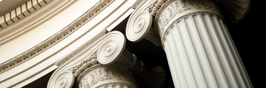 Closeup of the top of ionic columns