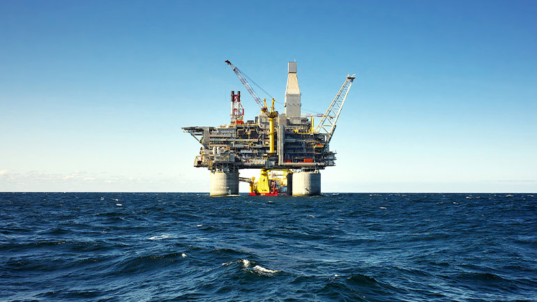Oil platform out at sea.