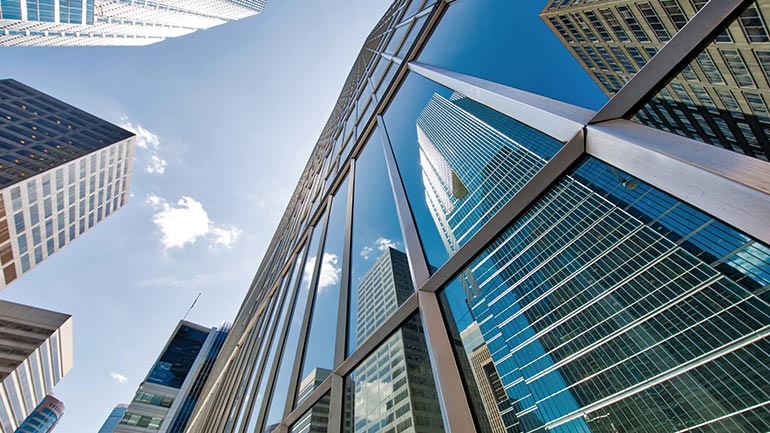 Looking upwards at office buildings