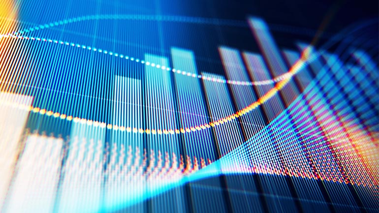 Closeup of a computer monitor showing charts and graphs.