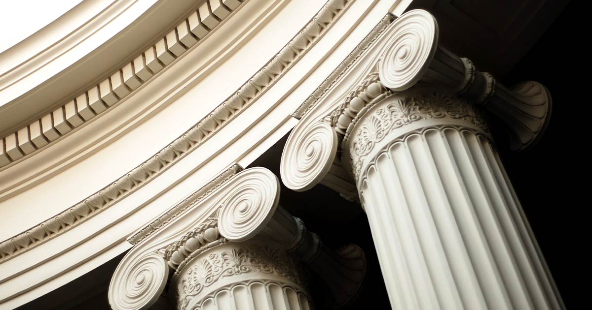 Close-up of classical architectural columns with ornate capitals.